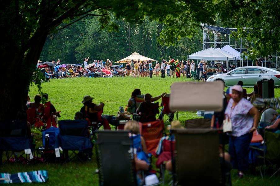 Enjoying a summer afternoon in Howe Meadow at Rhythm on the River.